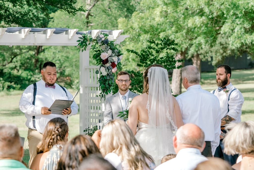 groom sees bride walking down aisle