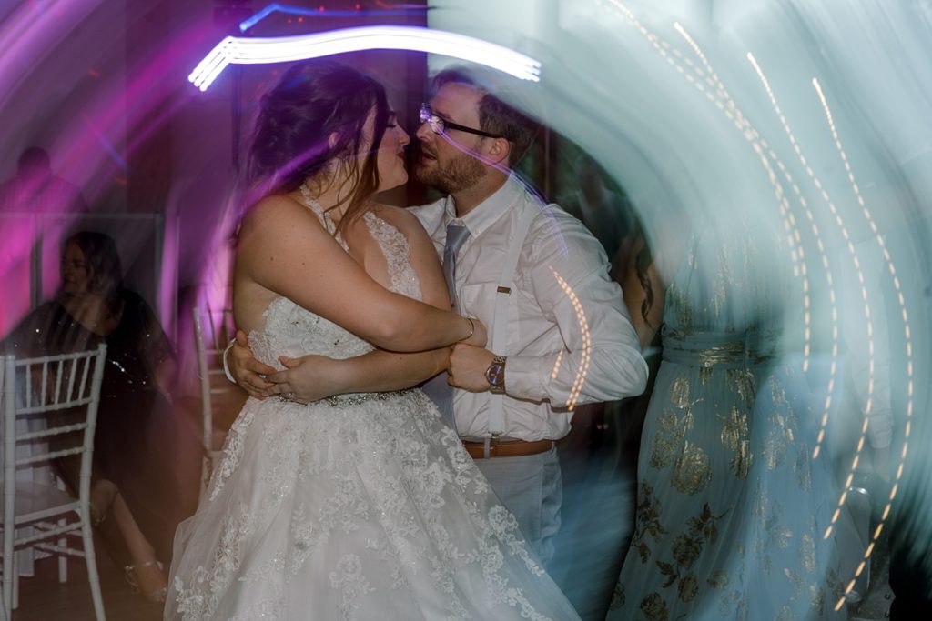 bride and groom dance at wedding reception