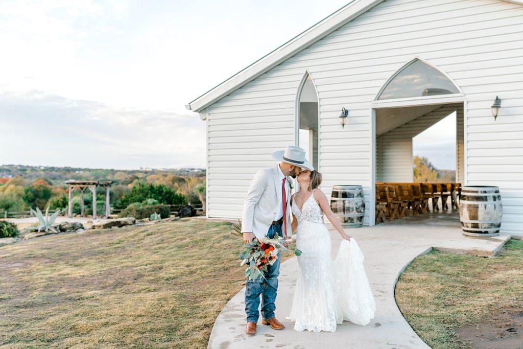 bride and groom kiss at Diamond H3 Ranch