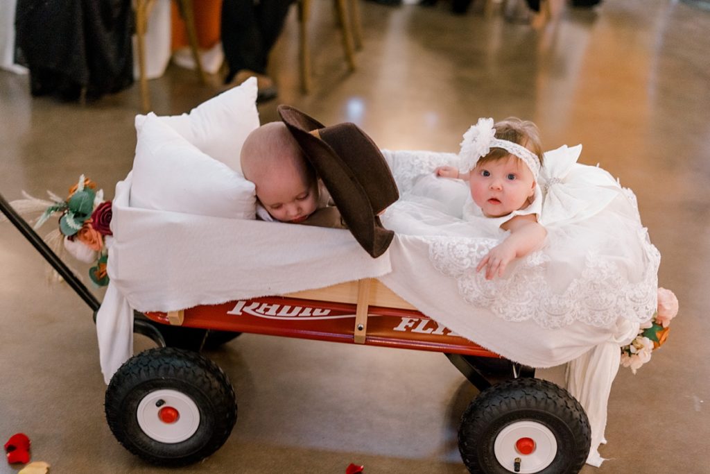 baby flower girl baby ring bearer in wagon