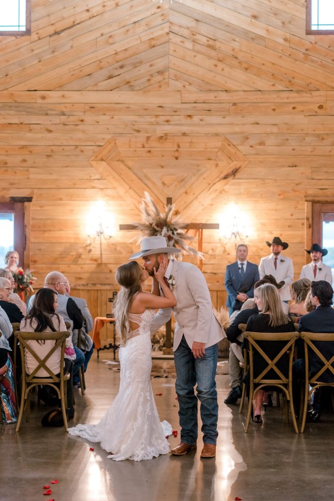 bride and groom kiss