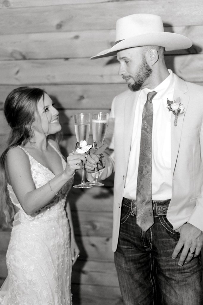 bride and groom toast champagne