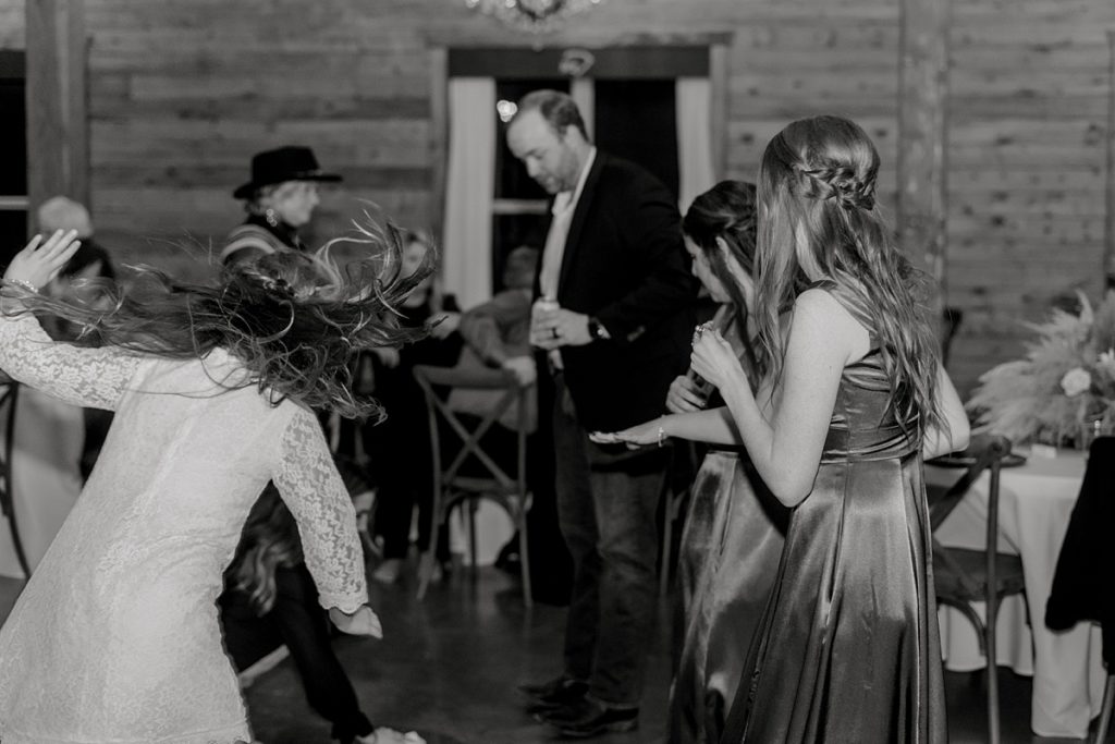 wedding guests dance at reception